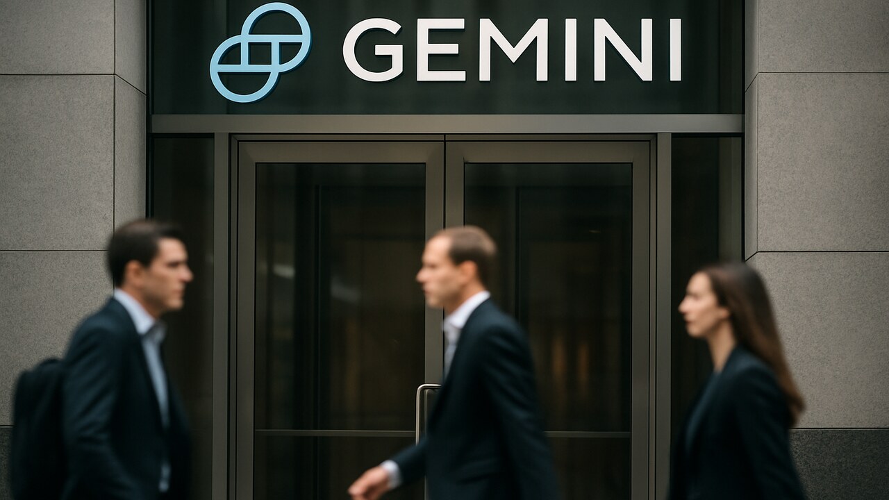 Vooraanzicht van een modern kantoorgebouw met het Gemini-logo bij de ingang