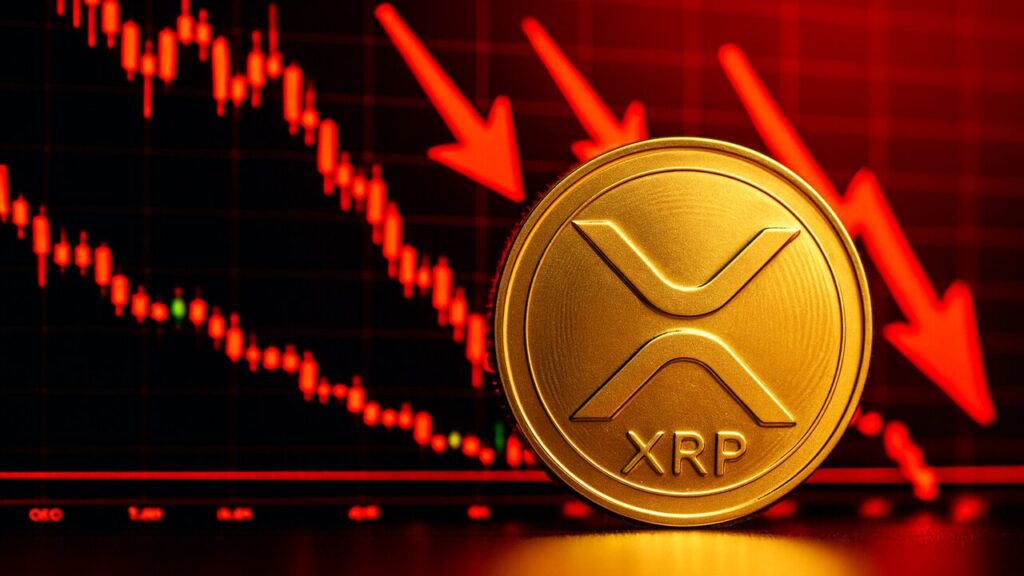 XRP-munt voor een scherm met een dalende rode koersgrafiek, symbool voor liquidatierisico