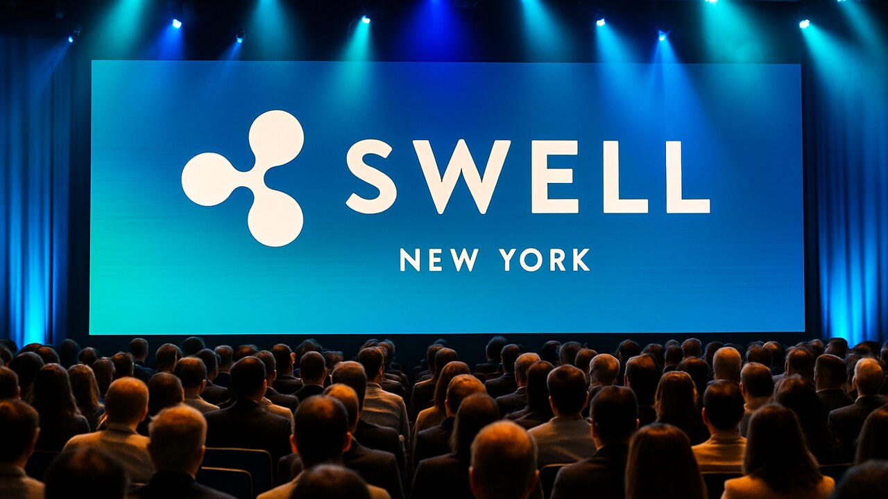 Podium met het Ripple Swell-logo op een conferentie in New York vol bezoekers